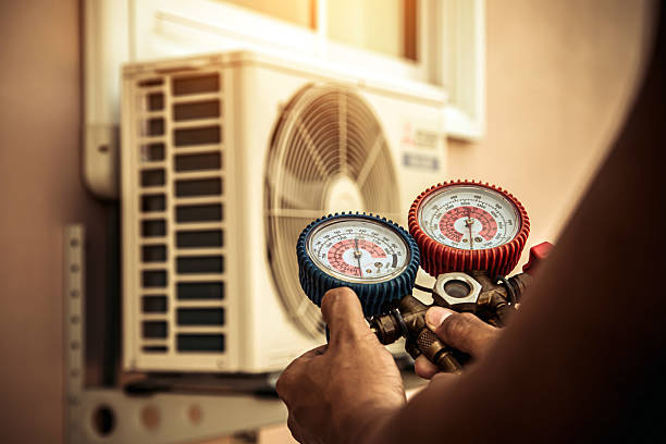 Professional Heat Pump Repair technician working in De Soto, KS